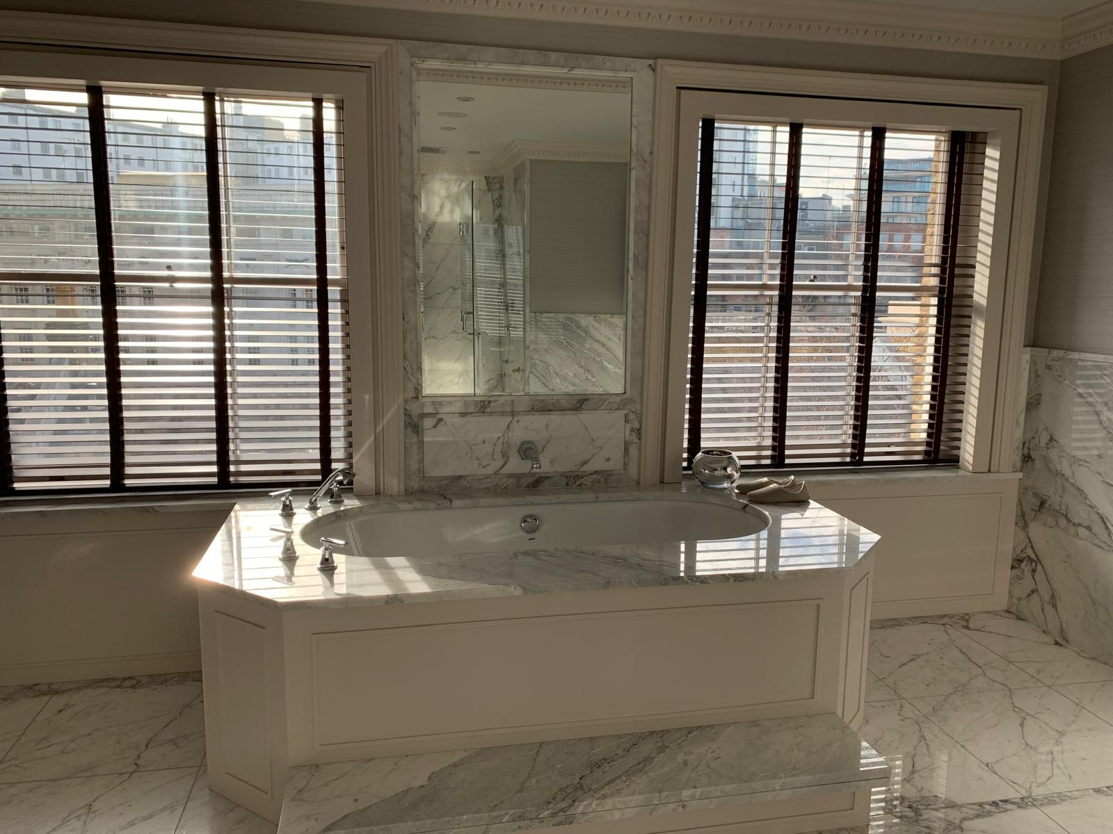 Marble bathroom with bathtub
